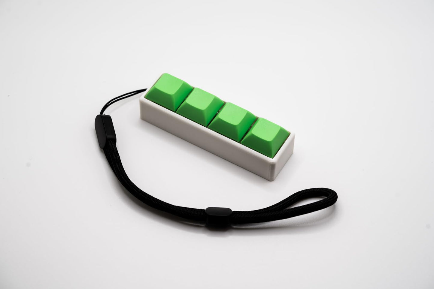 Four-Button Clicky Mechanical Switch Fidget Toy | Stim Toy, Stress Relief, Adhd (White Base, Green Keycaps)
