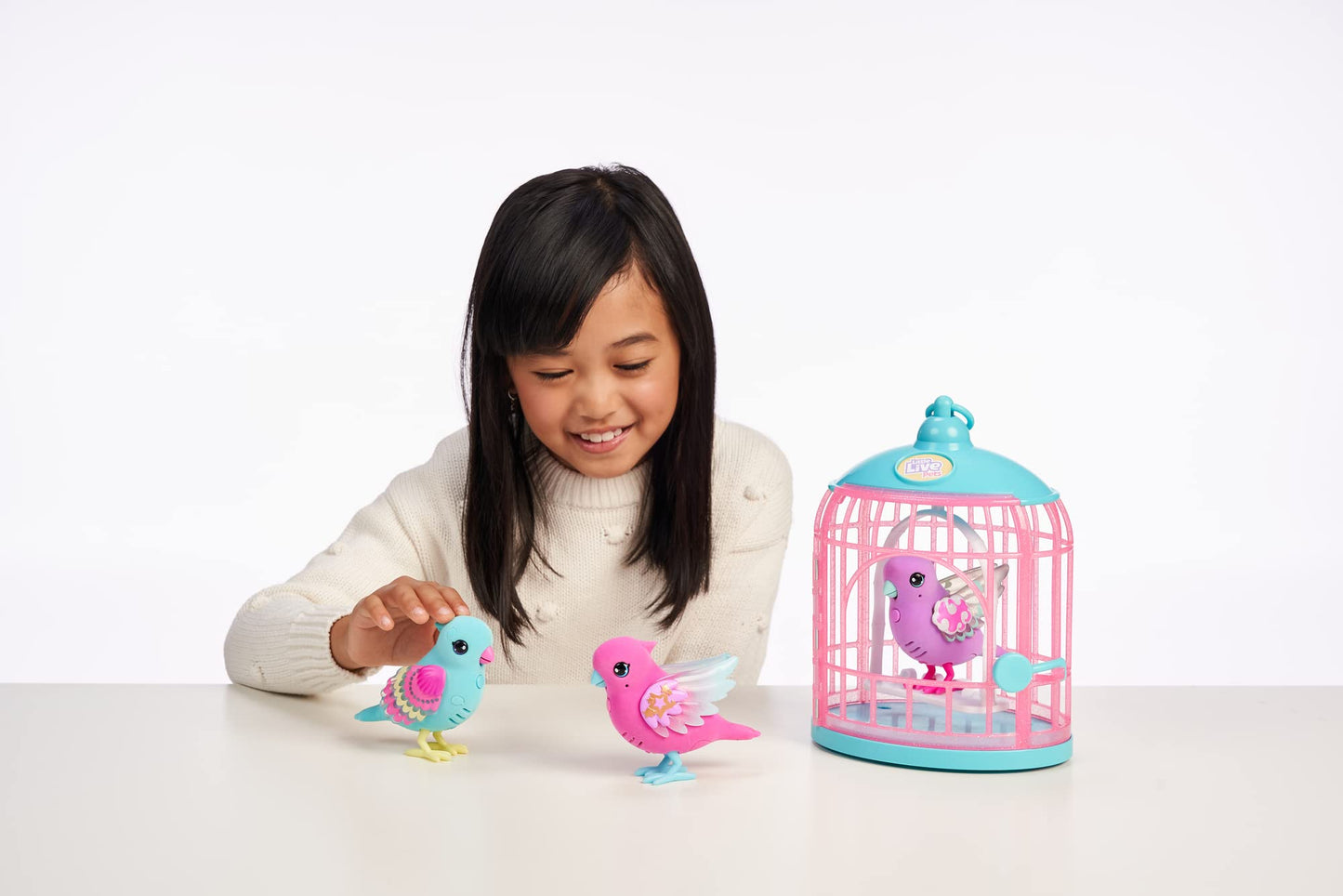 Little Live Pets - Lil' Bird Single Pack: Skyler | Interactive Toy Bird, 20+ Sounds, Light Up Wings, Repeats What You Say