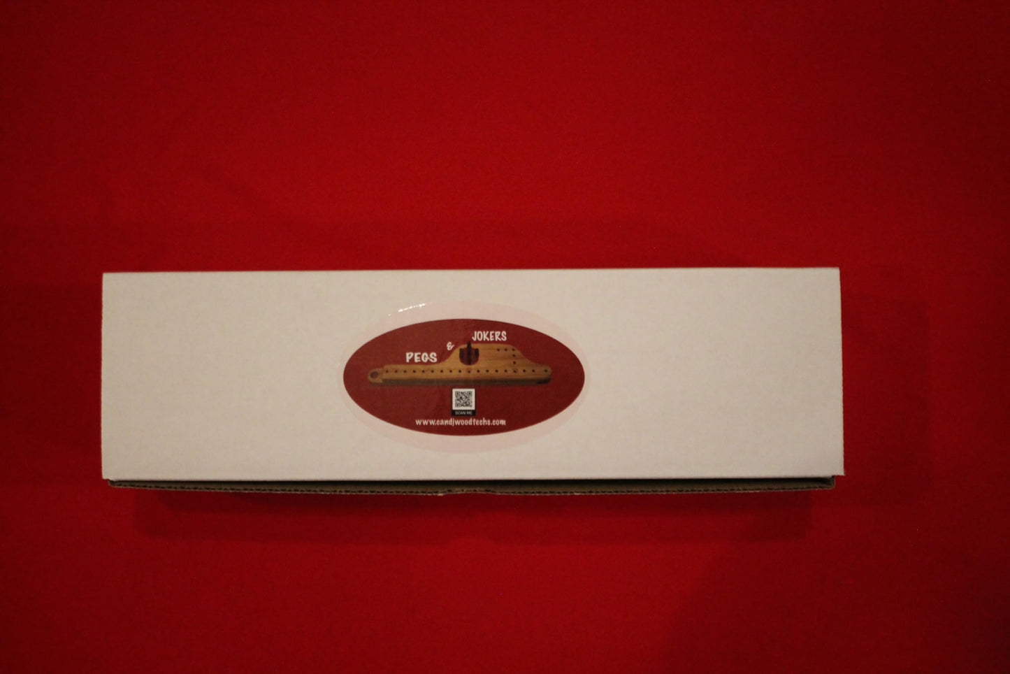 an mature-themed Game of Pegs and Jokers 8 Player Handcrafted in The USA of Select Pine Wood