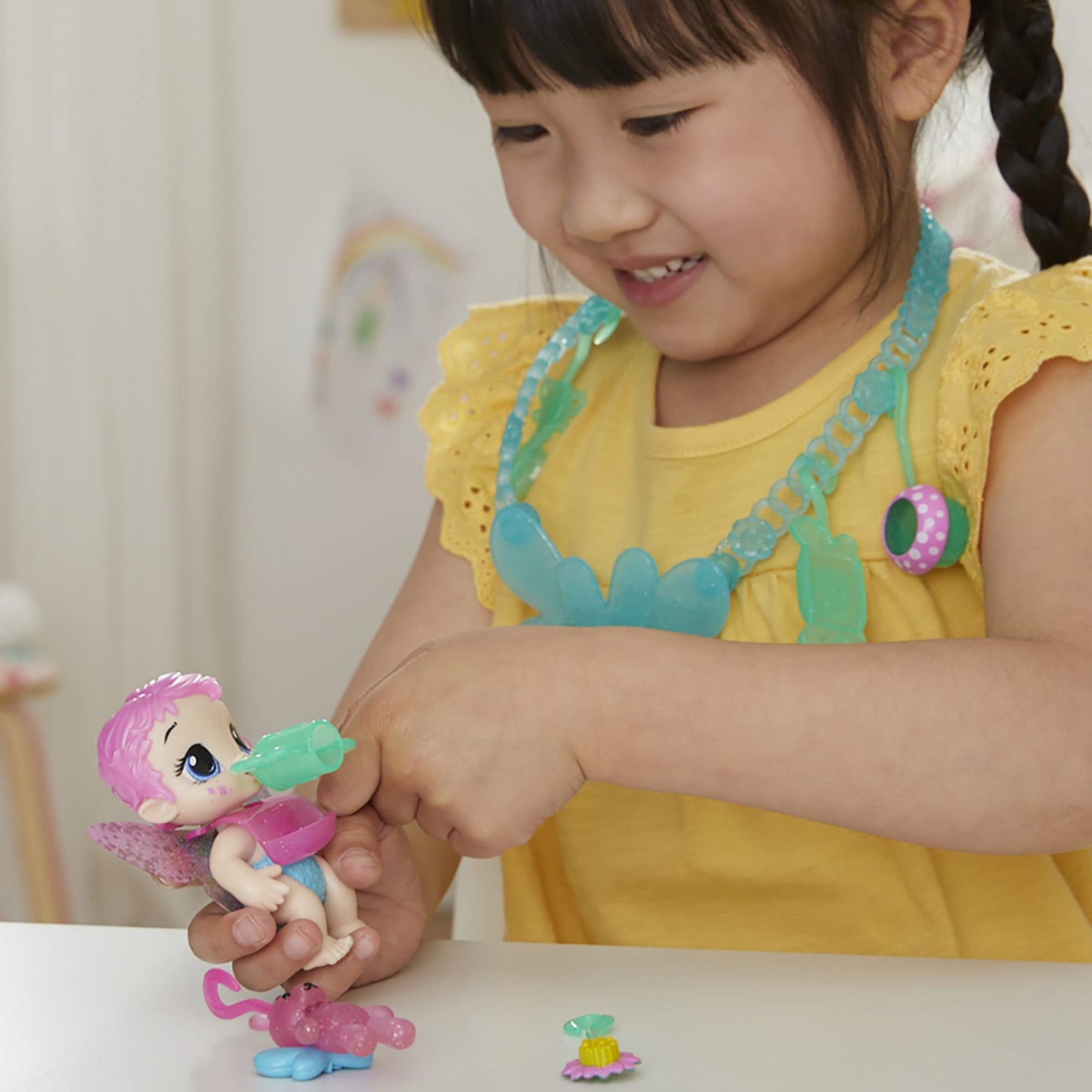 Baby Alive Glo Pixies Mini Doll - Sugar Sprinkle 3.75-Inch with Multicolor Carrier & Charm Necklace, Model F5843