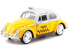 Motormax 1966 Volkswagen Beetle Taxi Yellow With White Top 1/24 Diecast Model Car