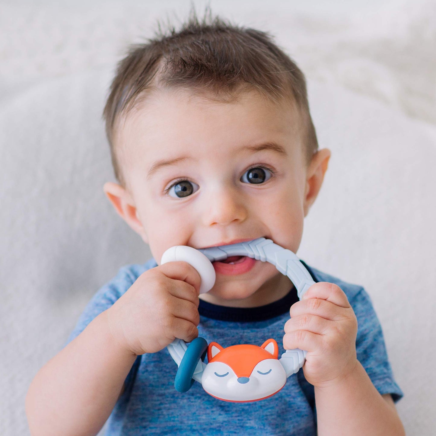 Itzy Ritzy Silicone Teether With Rattle; Rattle Teether Features Rattle Sound, Two Silicone Teething Rings And Raised Texture To Soothe Gums; Ages 3 Months And Up (Fox)