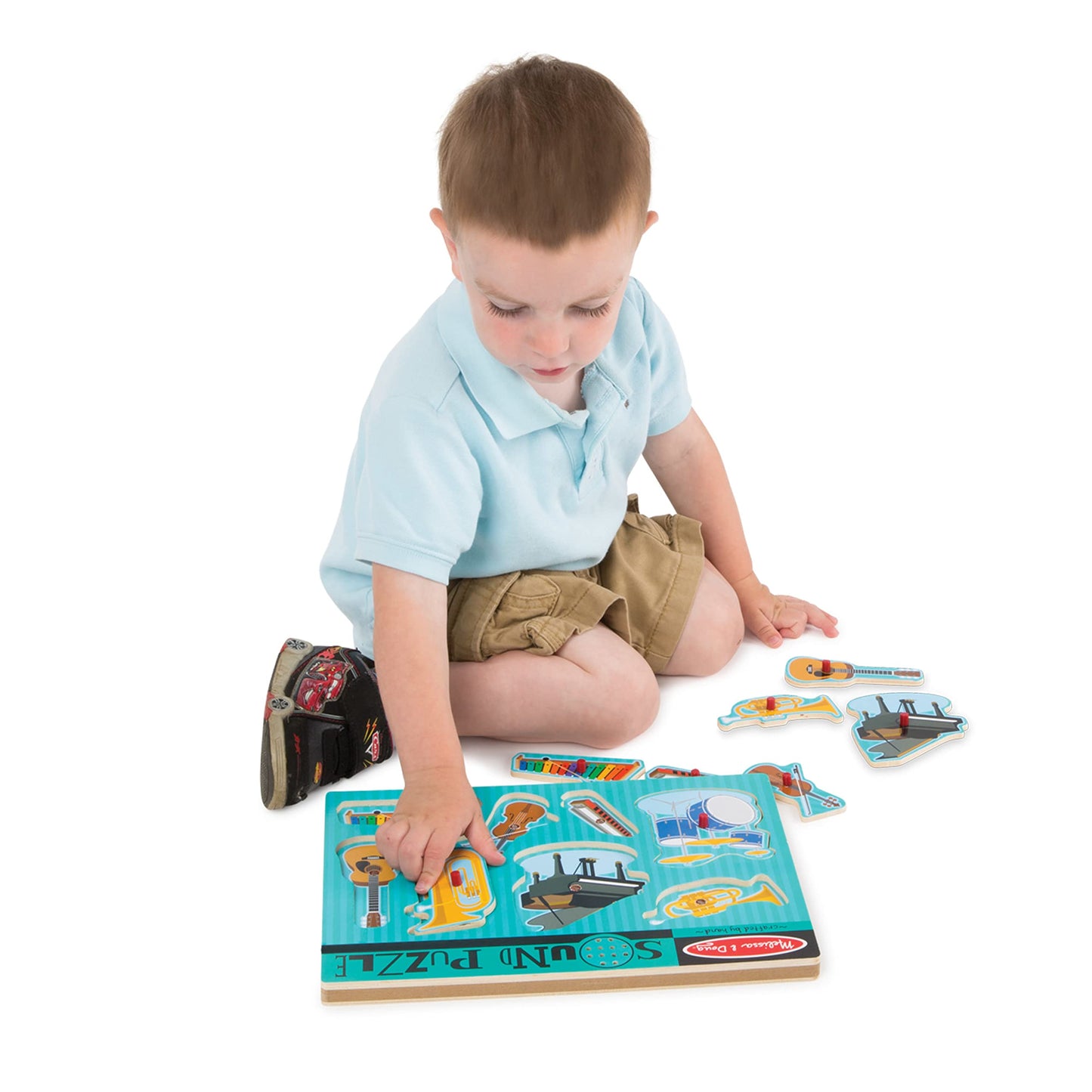 Melissa & Doug Musical Instruments Sound Puzzle - Wooden Peg Puzzle With Light-Activated Sound Effects (8 Pcs) Wooden Peg Baby Music Learning Toys, For Toddlers And Preschoolers Ages 2+