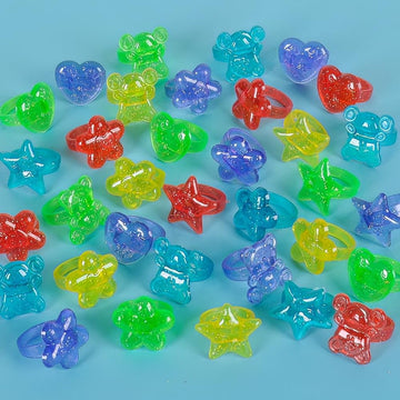 Rhode Island Novelty Plastic Glitter Rings, 144 Assorted Colors And Designs