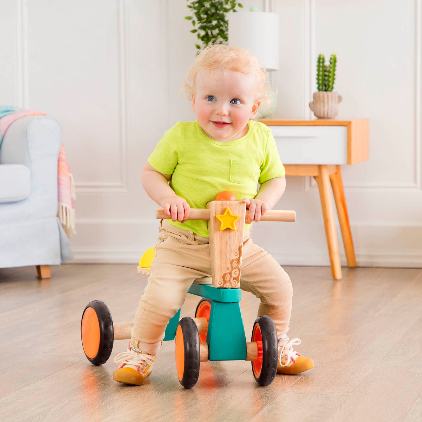 B. Toys- Smooth Rider- Ride On- Wooden Toddler Bike – Balance Toys For Toddlers – Push & Ride Bike – Four Wheels – 18 Months +, Large, Multicolor