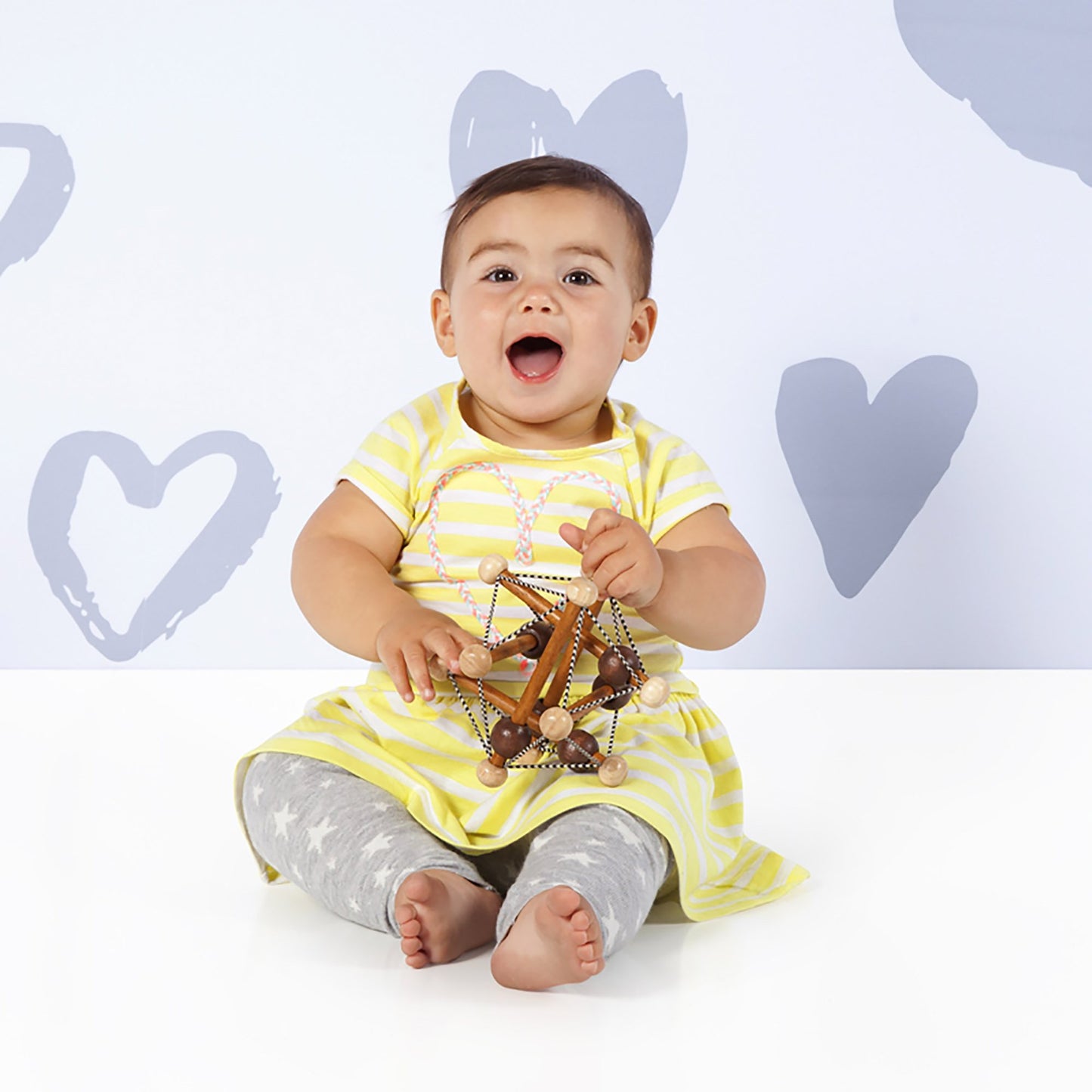 Manhattan Toy Artful Skwish Wooden Baby Rattle And Motor Skill Activity Toy For Infants And Toddlers
