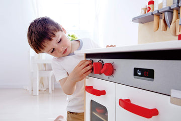 Hape Gourmet Kitchen Toy - Wooden Play Kitchen Set with Sink, Stove, Oven, Red, Model E3152