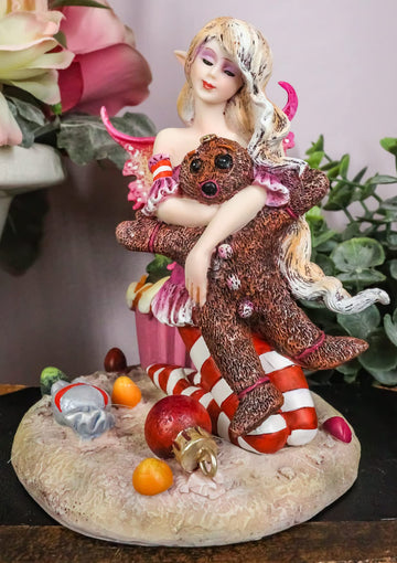 Ebros Festive Christmas Eve Holiday Fairy Hugging Gingerbread Man Statue By Amy Brown 'Twas The Night' Faery Garden Fantasy Collector Figurine As Accent Decor Or Gift Idea