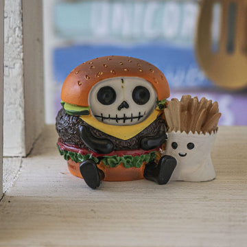 Furrybones Burger Signature Skeleton In A Burger Costume With An Order Of Fries On The Side