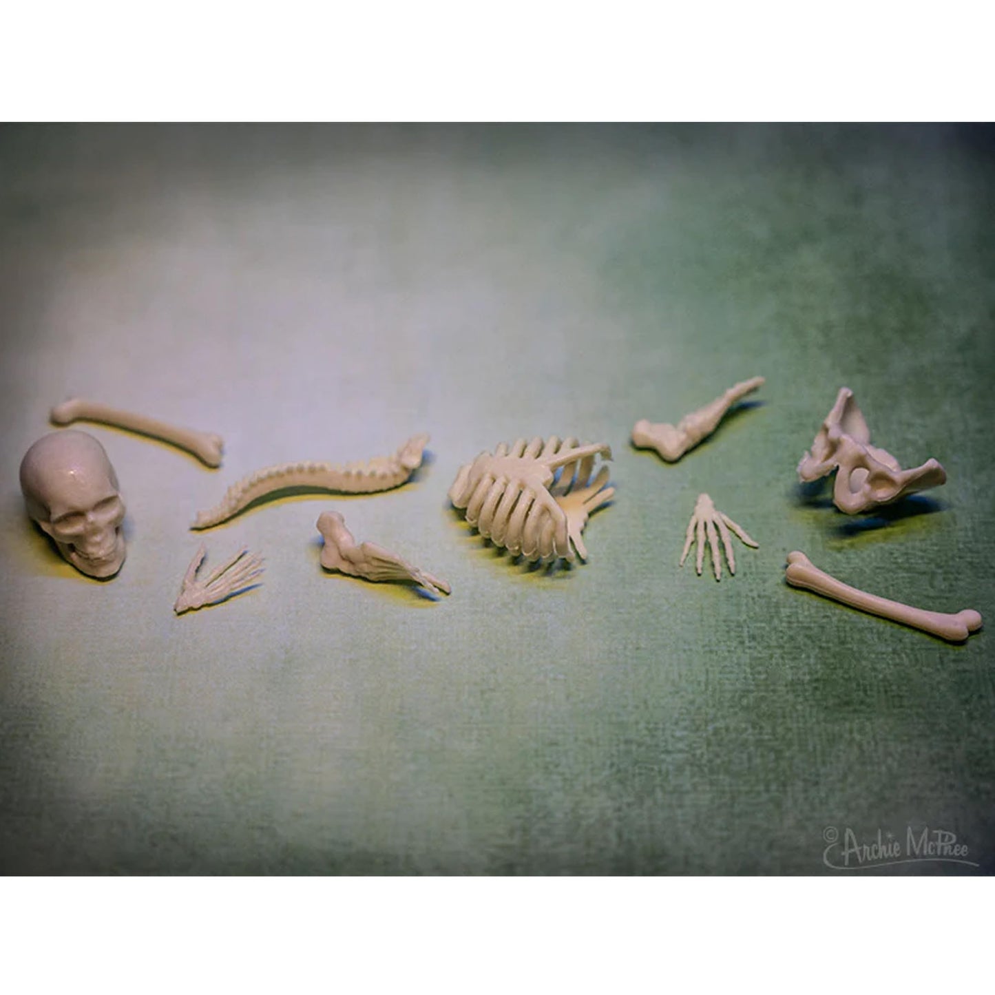 Accoutrements Itty Bitty Bones Glow In The Dark 10 Piece Set - Miniature Bones For Tiny Halloween Displays - Random Soft Vinyl B