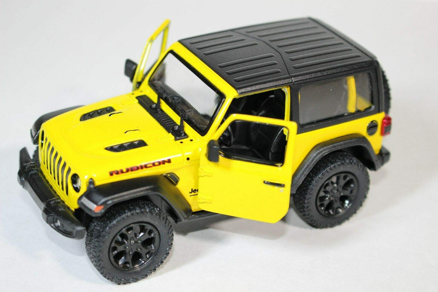 KiNSMART Jeep Wrangler Rubicon Die Cast Model Car 1:34 Scale 5 inch Yellow Hardtop KT5412DBYL