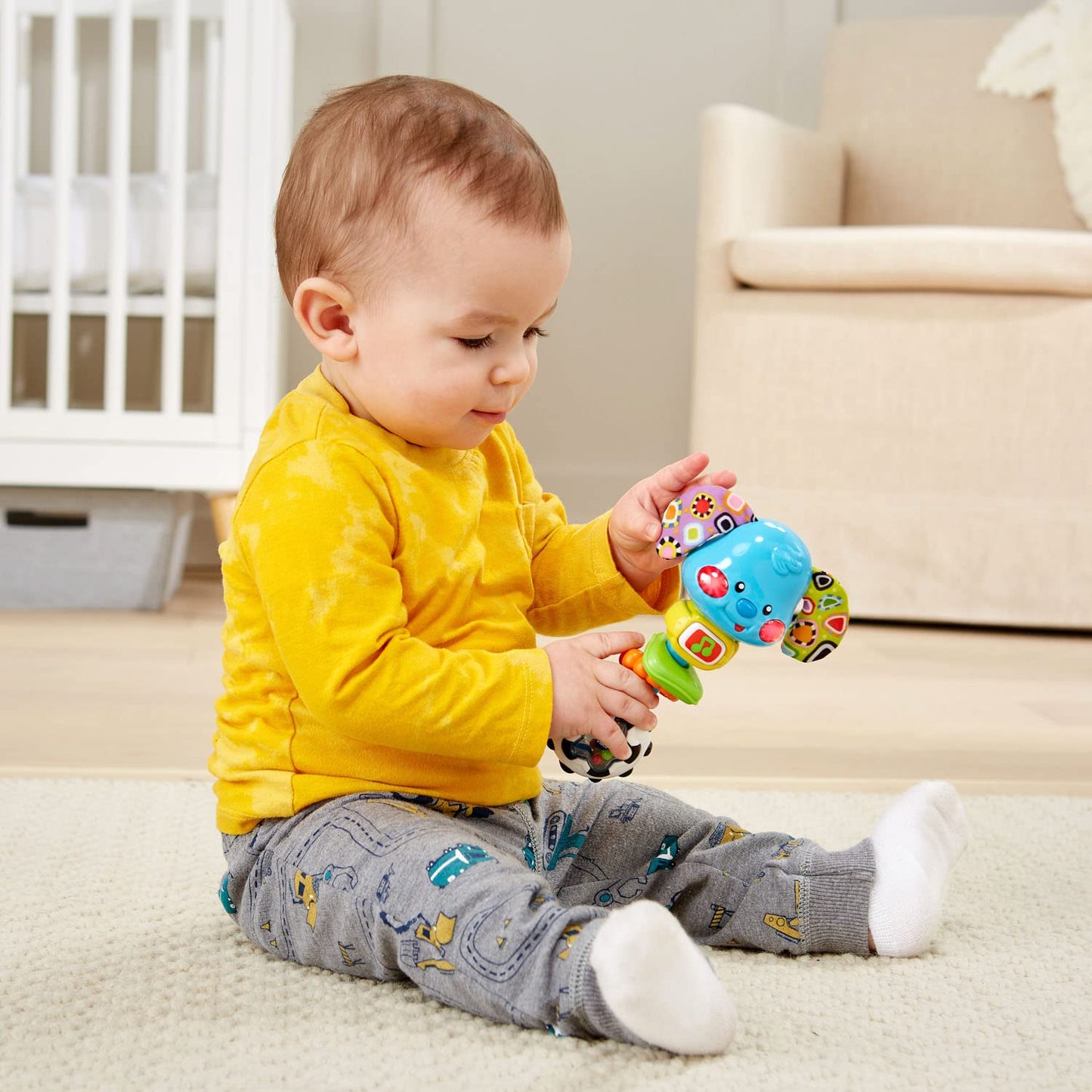 VTech Baby Rattle and Sing Puppy - Multicolor Small Plush Toy for Infants, Soft Interactive Learning Toy
