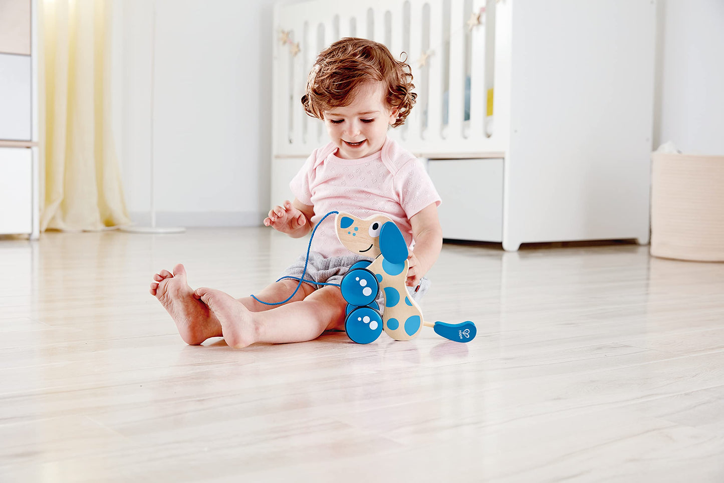 Hape Walk-A-Long Puppy Wooden Pull Toy | Push Pull Toy Puppy For Toddlers Can Sit, Stand And Roll. Rubber Rimmed Wheels For Easy Push And Pull Action, Blue