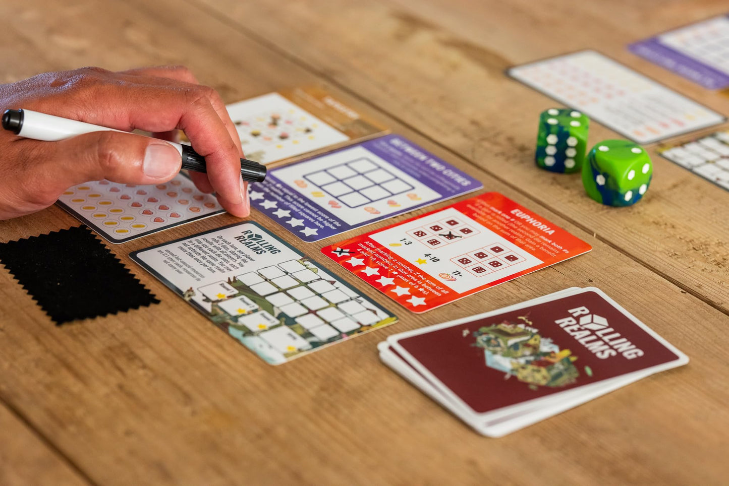 Stonemaier Games: Rolling Realms | A Light Strategic Roll-And-Write Game For Families And Adults | 1-6 Players, 30 Mins, Ages 14