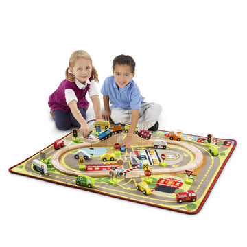 Melissa & Doug Deluxe Multi-Vehicle Activity Rug (39.5' X 36.5') - 19 Vehicles, 12 Wooden Signs, Train Tracks
