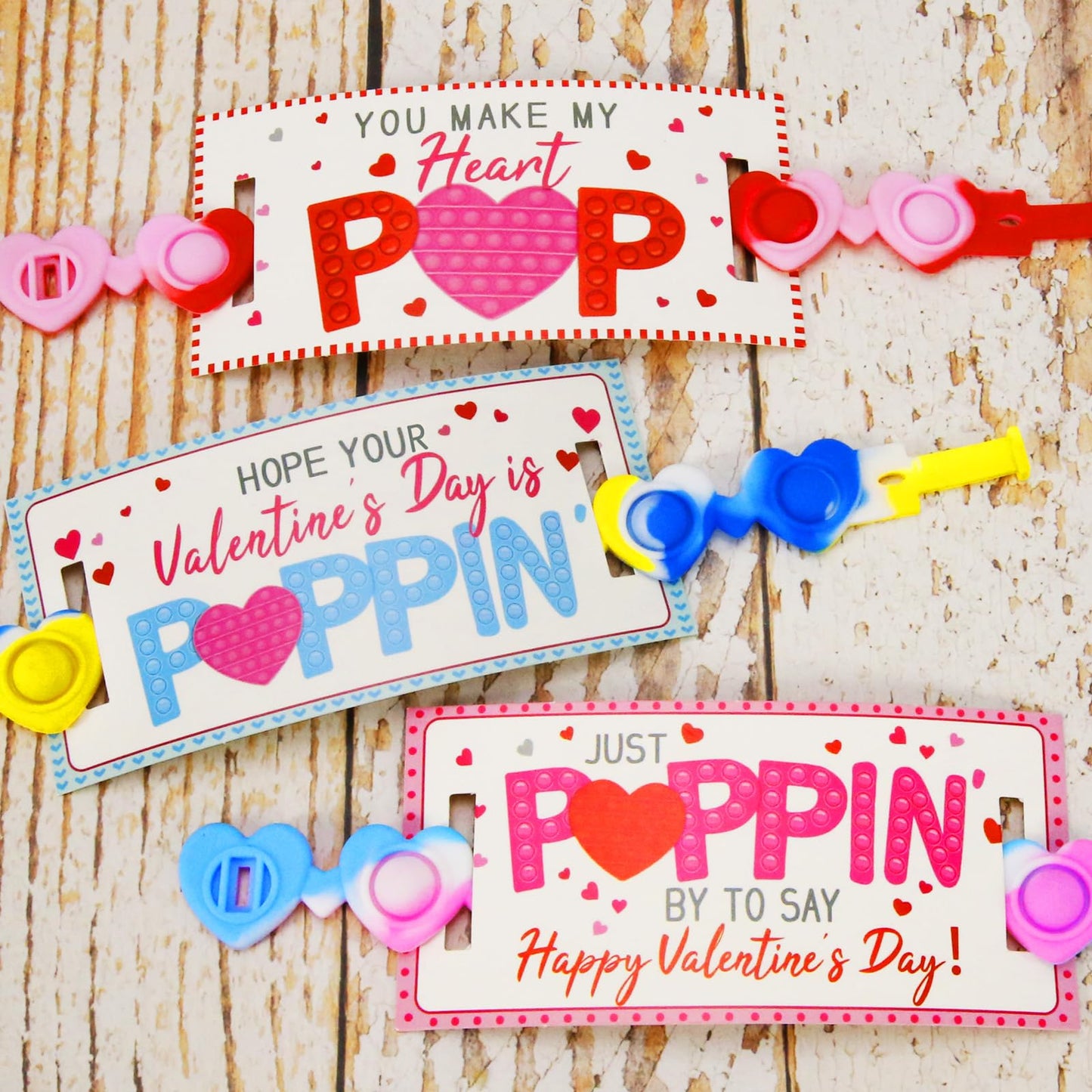 Valentines Day Gifts for Kids - 24 Pack Valentines Cards with Heart POP Bracelets - Sensory Fidget Toys Valentine for School Cla