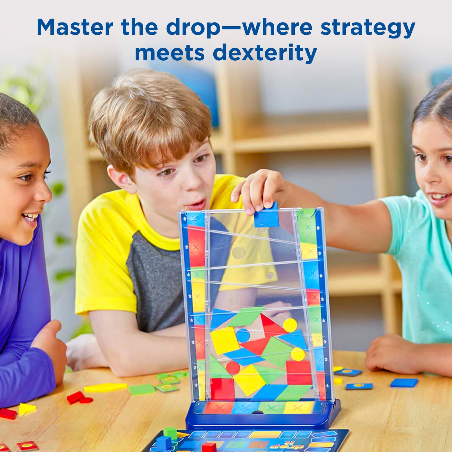 Thames & Kosmos Drop It | Super Fun Family Strategy Game | Parents' Choice Silver Award Winner, Multi-Color Small