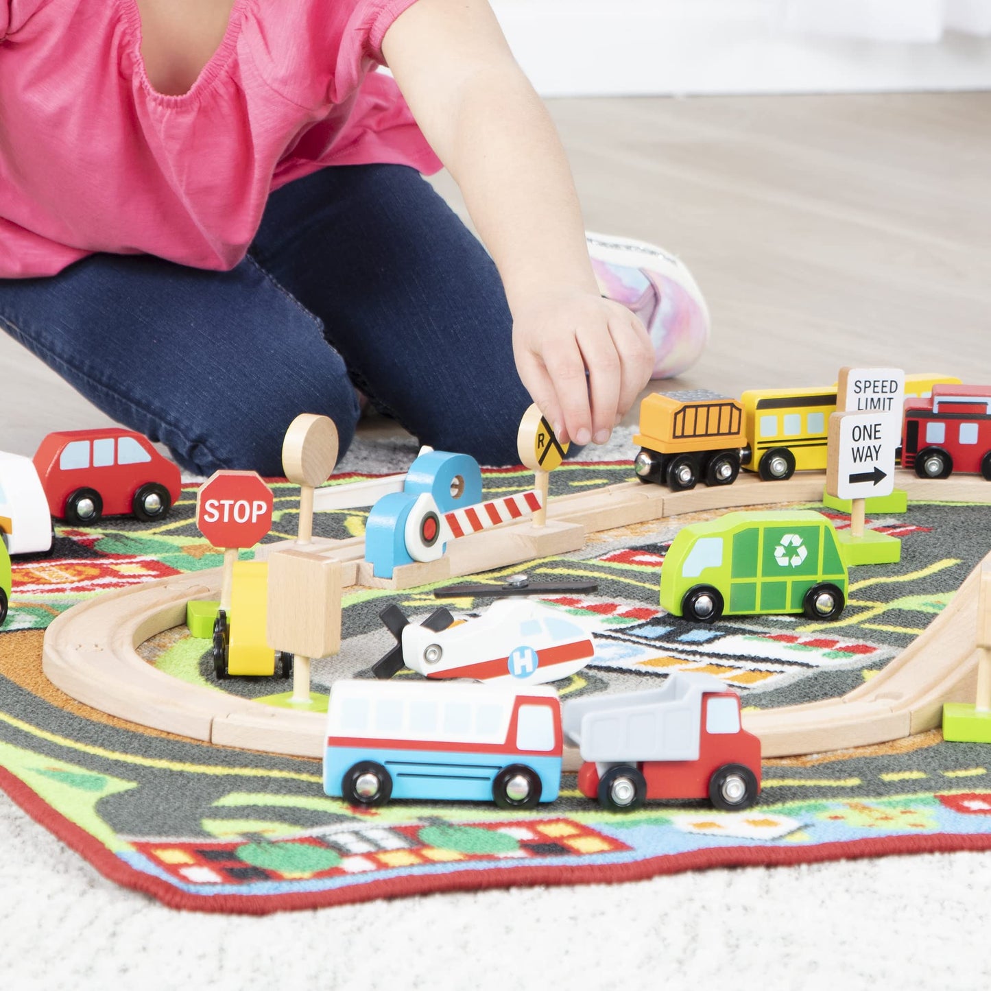 Melissa & Doug Deluxe Multi-Vehicle Activity Rug (39.5' X 36.5') - 19 Vehicles, 12 Wooden Signs, Train Tracks