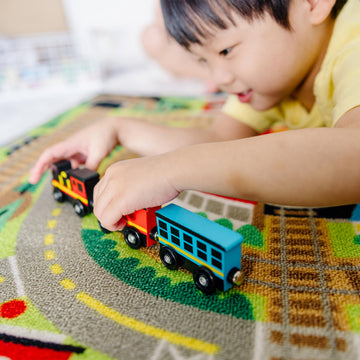 Melissa & Doug Round The Rails Train Activity Play Rug, 3 Wooden Train Cars (39' X 36')