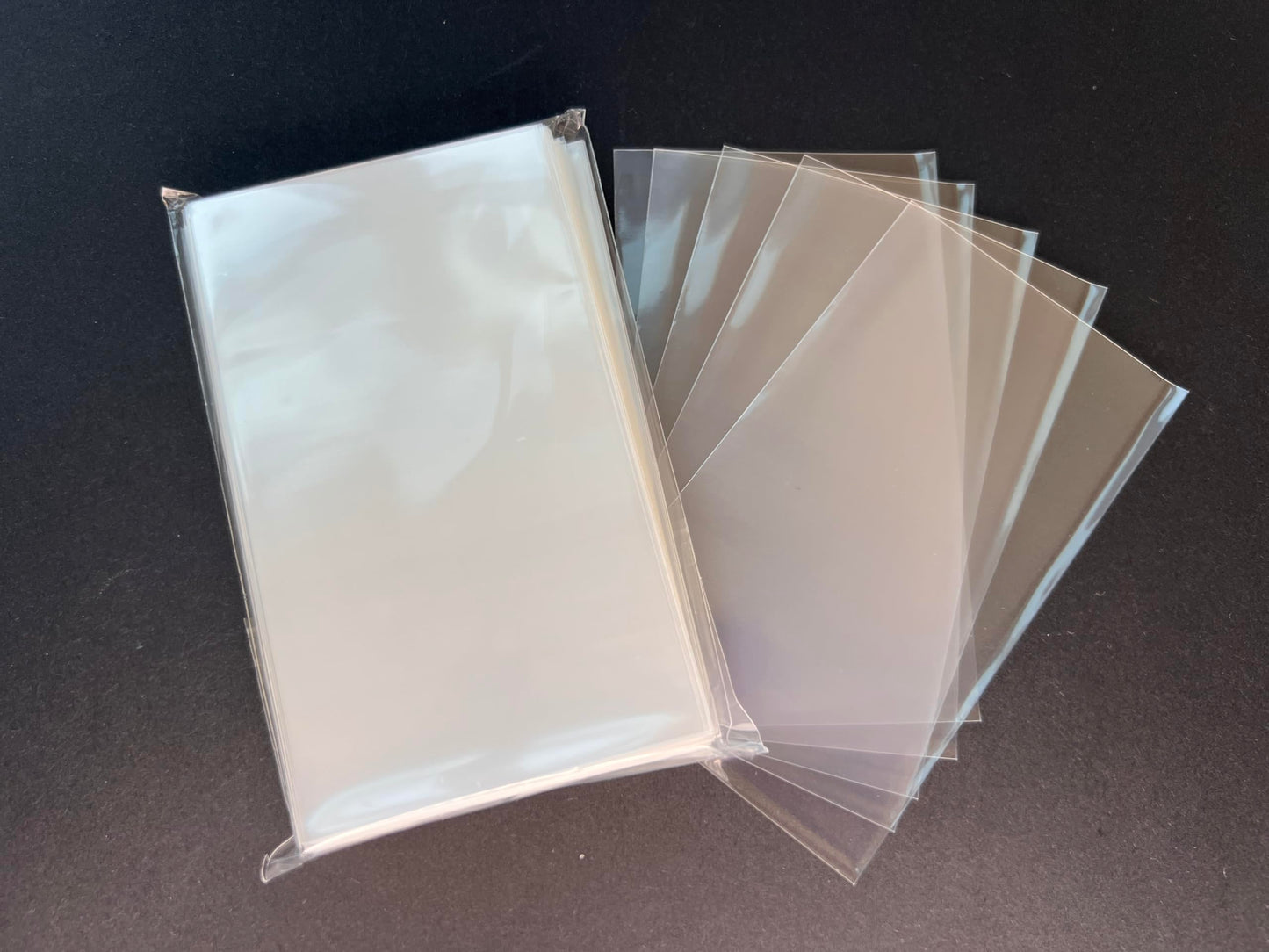 Premium Card Sleeves: 'Kingdom Death Gambler'S Chest Large Compatible Sleeves (57 X 100 Mm) -110 Per Pack
