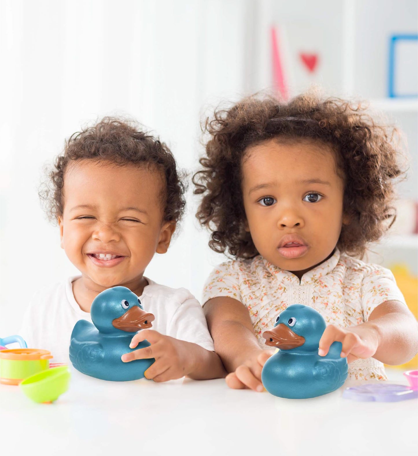 DolliBu Metallic Blue Duck Bath Buddy Squirter - Floating Blue Duck Rubber Bath Toy Fun Water Squirting Bath Time Play for Toddlers Animal Toy for Bathtub Beach and Pool for Girls and Boys