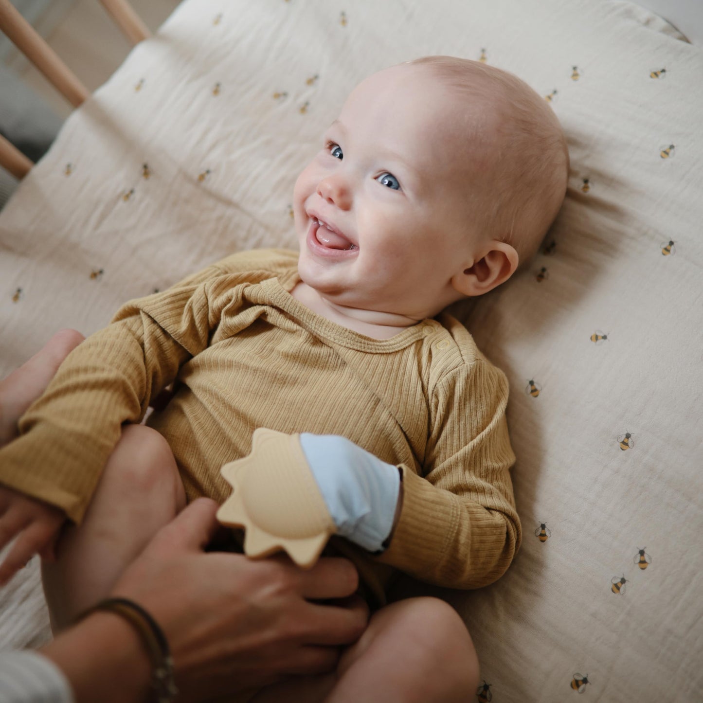 mushie Silicone Teething Mitten for Babies 3 Months+ (Sun) | Textured Silicone & Sensory Fabric with Adjustable Strap