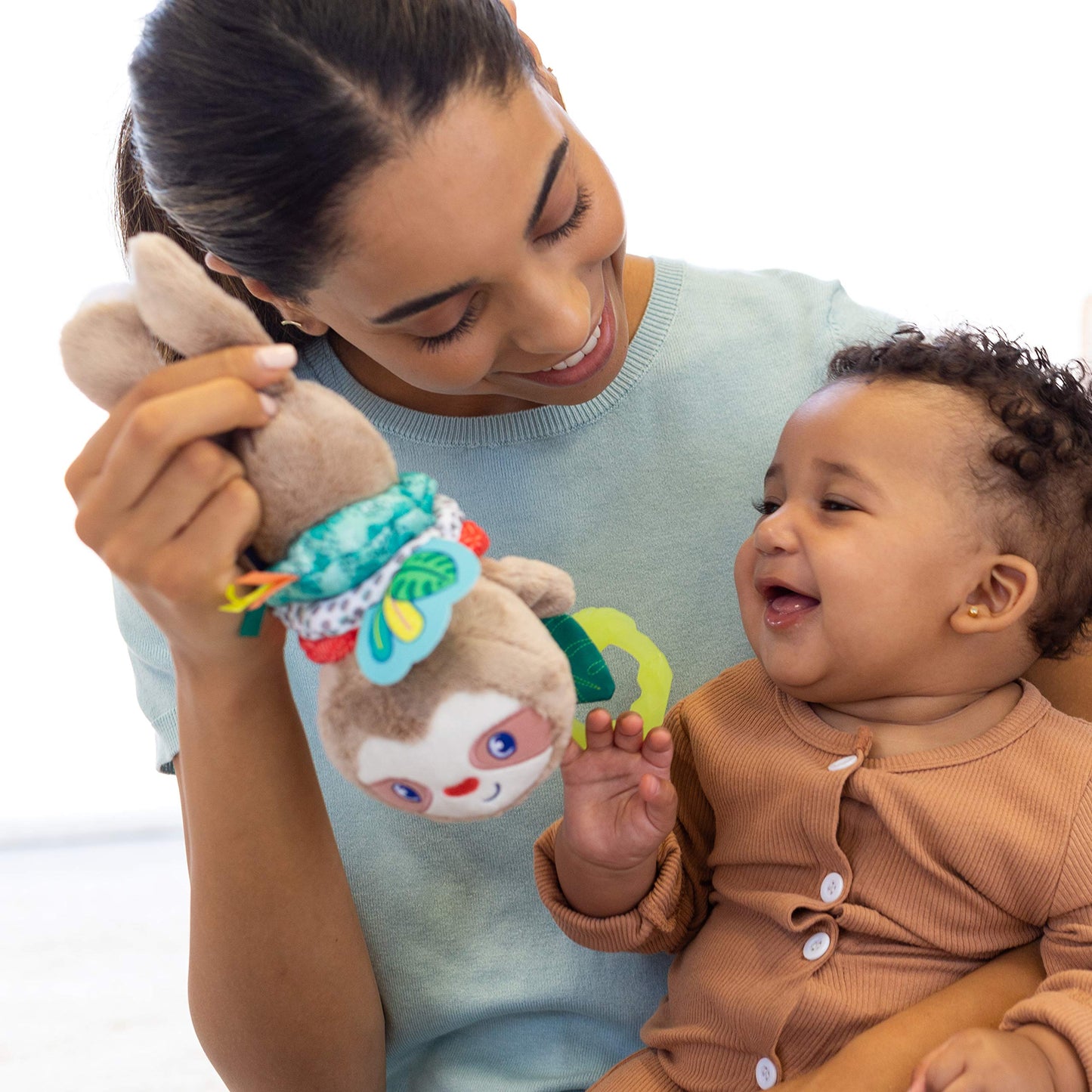 Infantino Music & Motion Pulldown Sloth - Musical Plush Sloth With Multi-Textured Teether For Tactile Exploration, Easily Attaches To Strollers And Gyms, Bpa-Free