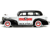 1939 Chevrolet Master Deluxe Black And White ''Monopoly'' And Mr. Monopoly Diecast Figure ''Hollywood Rides'' Series 1/24 Diecas
