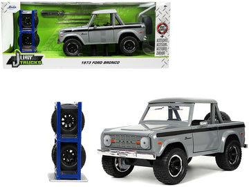 1973 Ford Bronco Pickup Truck Gray With Black Stripes With Extra Wheels ''Just Trucks'' Series 1/24 Diecast Model Car By Jada