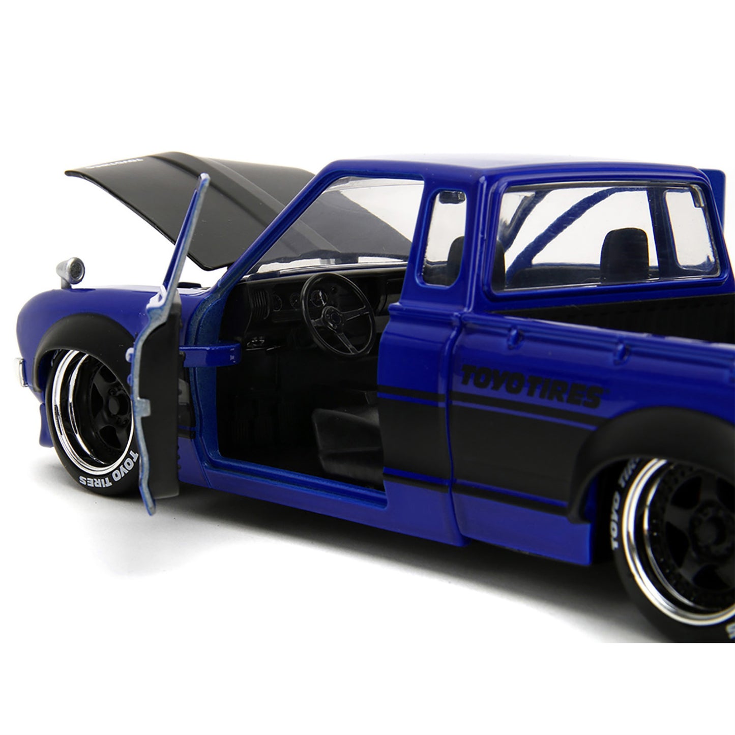 1972 Datsun 620 Pickup Truck #72 Blue Metallic with Black Stripes and Hood Toyo Tires with Extra Wheels Just Trucks Series 1/24