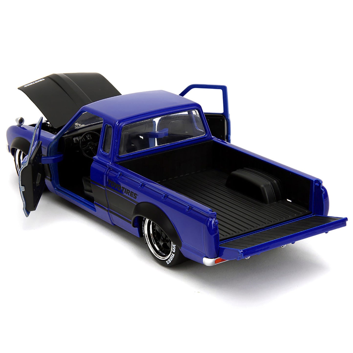 1972 Datsun 620 Pickup Truck #72 Blue Metallic with Black Stripes and Hood Toyo Tires with Extra Wheels Just Trucks Series 1/24