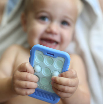Nuby Cell Phone Popper Sensory Play Teether Toy - 3+ Months, 1Pk Assorted Neutral Colors