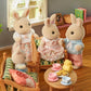 Calico Critters Milk Rabbit Family - Set of 4 Collectible Doll Figures, Plastic, Multicolor, Ages 3+ - Model CC2075