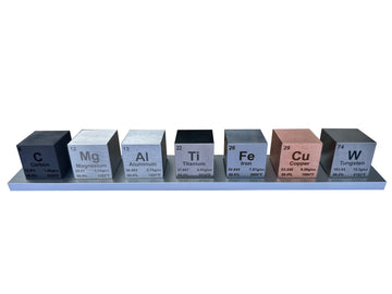 1.5 Element Cube Set - 7 Pure Metal Density Cubes with Engraved Atomic Data - Precision Machined Science Specimens + Display Sta