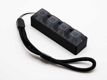 Four-Button Clicky Mechanical Switch Fidget Toy | Stim Toy, Stress Relief, Adhd (Black Base, Transparent Black Keycaps)