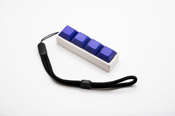 Four-Button Clicky Mechanical Switch Fidget Toy | Stim Toy, Stress Relief, Adhd (White Base, Purple Keycaps)