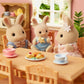 Calico Critters Milk Rabbit Family - Set of 4 Collectible Doll Figures, Plastic, Multicolor, Ages 3+ - Model CC2075