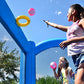 Bounceland Royal Palace Inflatable Bounce House [Blower NOT Included], Long Slide, Large Bouncing Area, Basketball Hoop and Sun