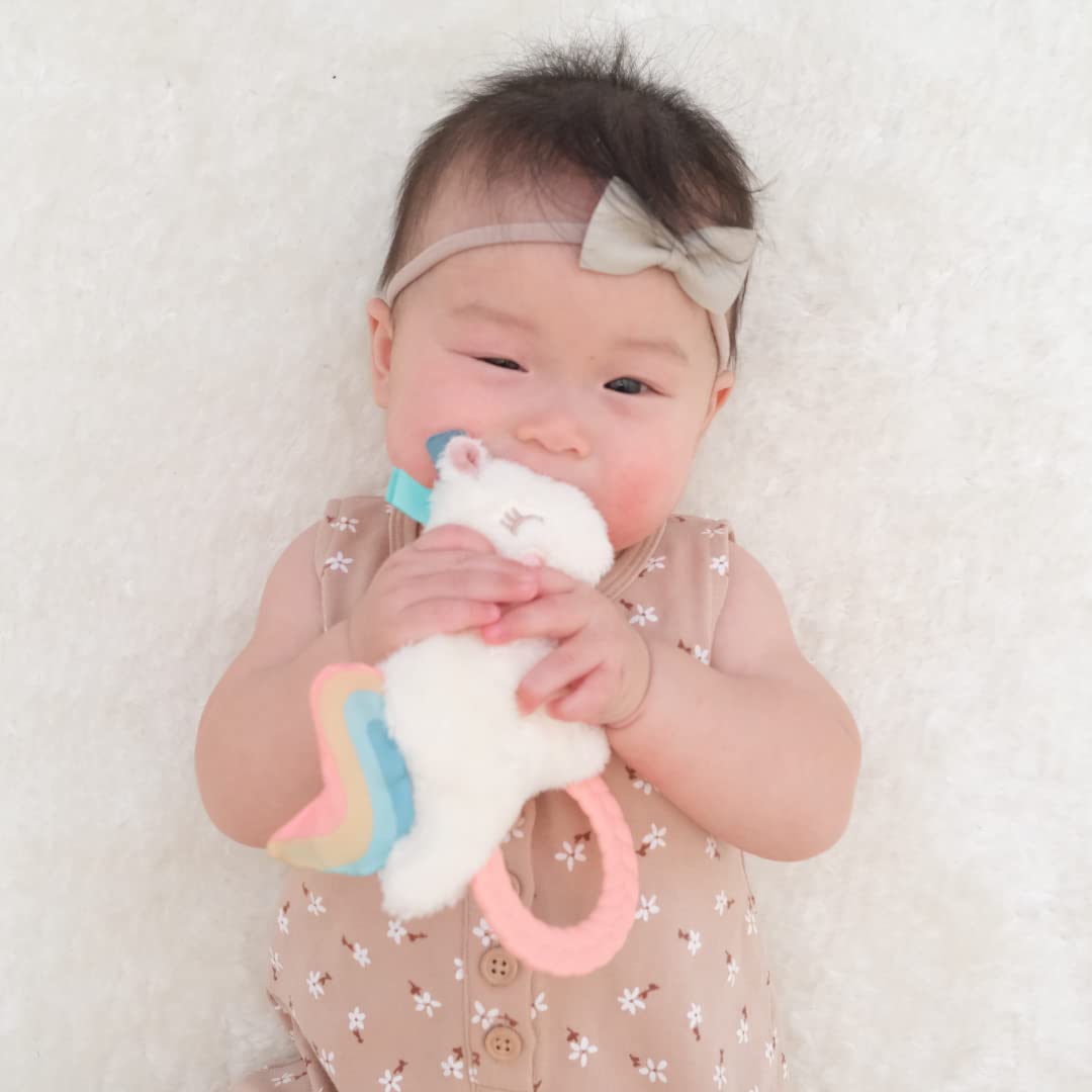 Itzy Ritzy - Ritzy Rattle Pal With Teether - Baby Teething Toy Features A Minky Plush Character, Gentle Rattle Sound & Soft Teether Toy For Newborn (Unicorn)