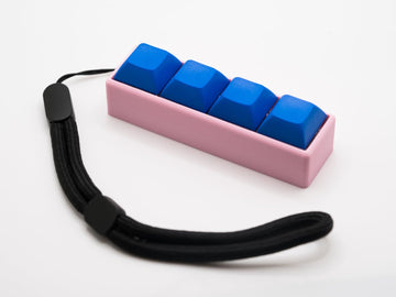 Four-Button Clicky Mechanical Switch Fidget Toy | Stim Toy, Stress Relief, Adhd (Pink Base, Blue Keycaps)