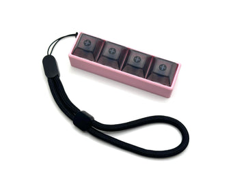 Four-Button Clicky Mechanical Switch Fidget Toy | Stim Toy, Stress Relief, Adhd (Pink Base, Transparent Black Keycaps)
