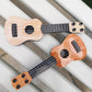 Toddmomy Ukulele Musical Toy for Kids - Plastic Ukulele Toy with Nylon Strings - Beginner Friendly (Beige)