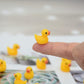 Yuronam 70 Pcs Tiny Ducks Mini Resin Ducks Miniature Ornaments for Slime, Dollhouse, Garden Decoration(Yellow)