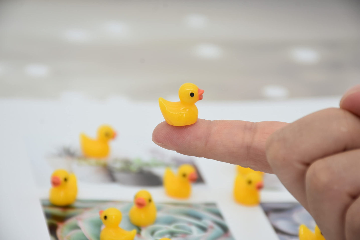 Yuronam 70 Pcs Tiny Ducks Mini Resin Ducks Miniature Ornaments for Slime, Dollhouse, Garden Decoration(Yellow)