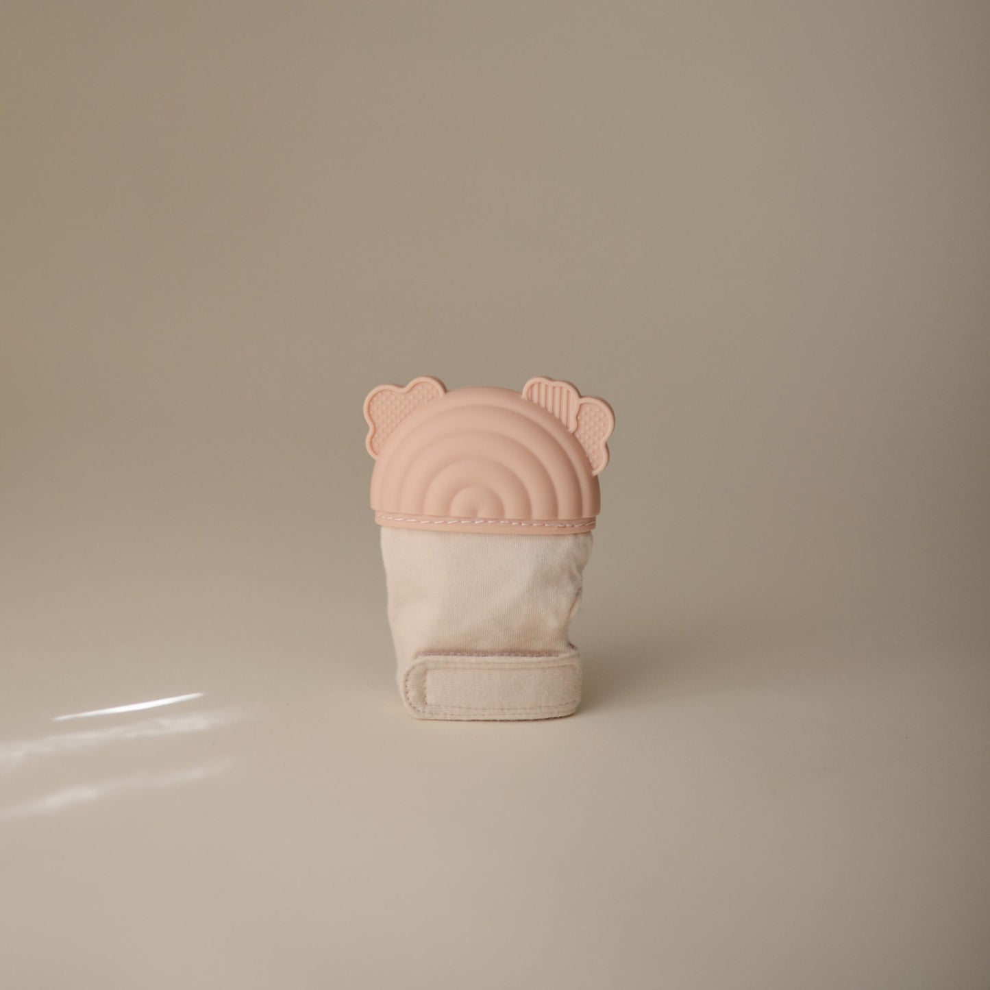 mushie Silicone Teething Mitten for Babies 3 Months+ (Rainbow) | Textured Silicone & Sensory Fabric with Adjustable Strap