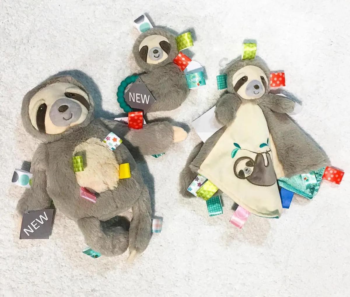 Taggies Sensory Stuffed Animal Soft Rattle with Teether Ring  Molasses Sloth
