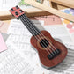 Toddmomy Melodic Fun for Kids: Plastic Ukulele Guitar - A Musical Toy Instrument for Children, Inspiring Musical Education and P