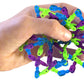 Twiddle Fidget Toy In Multiple Colors, Over 2' Of Fun Novelty, Blue, Green And Purple