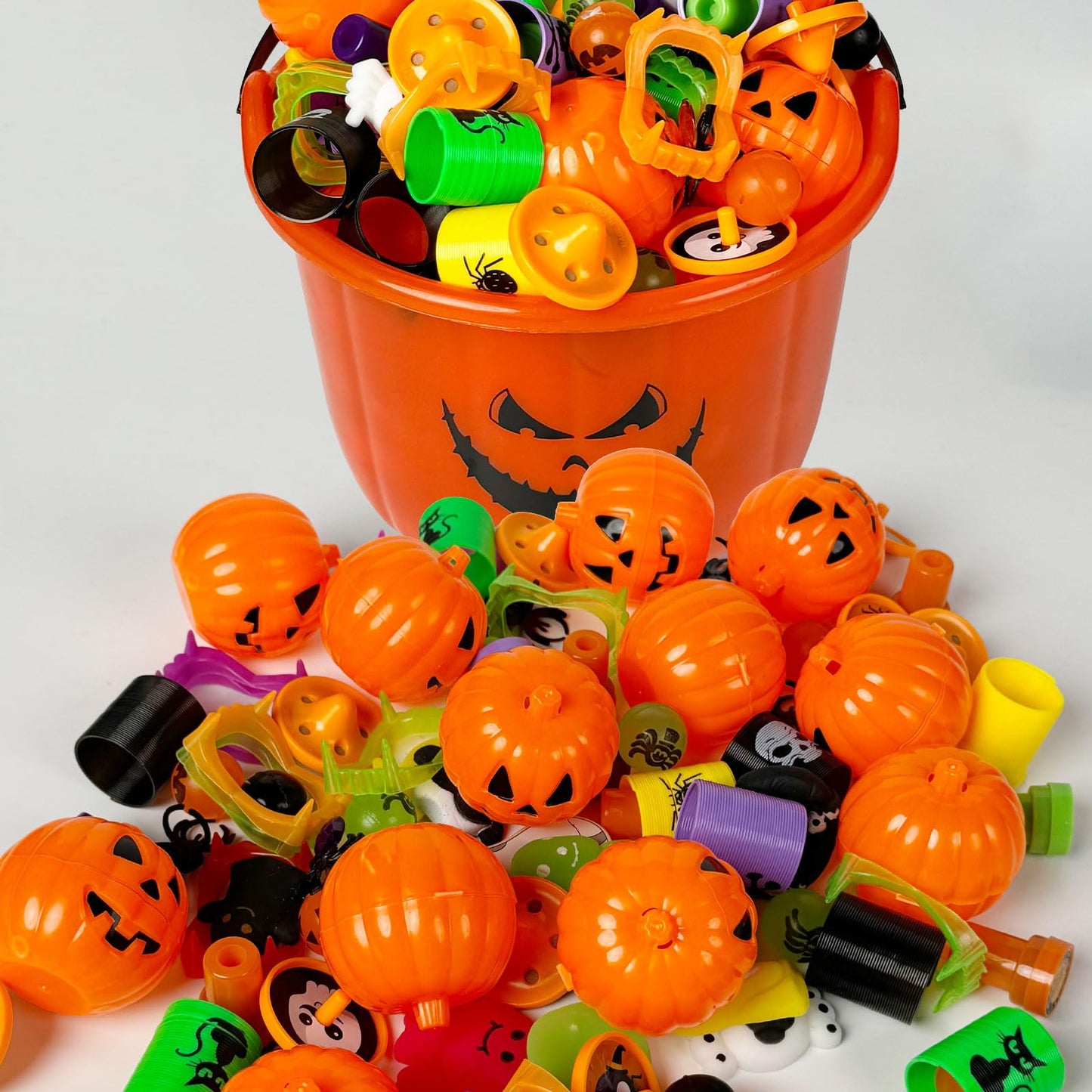 novelinks Halloween Party Favors for Kids 96PCS Halloween Toys in Bulk Halloween Prefilled Plastic Pumpkins Buckets Halloween Go