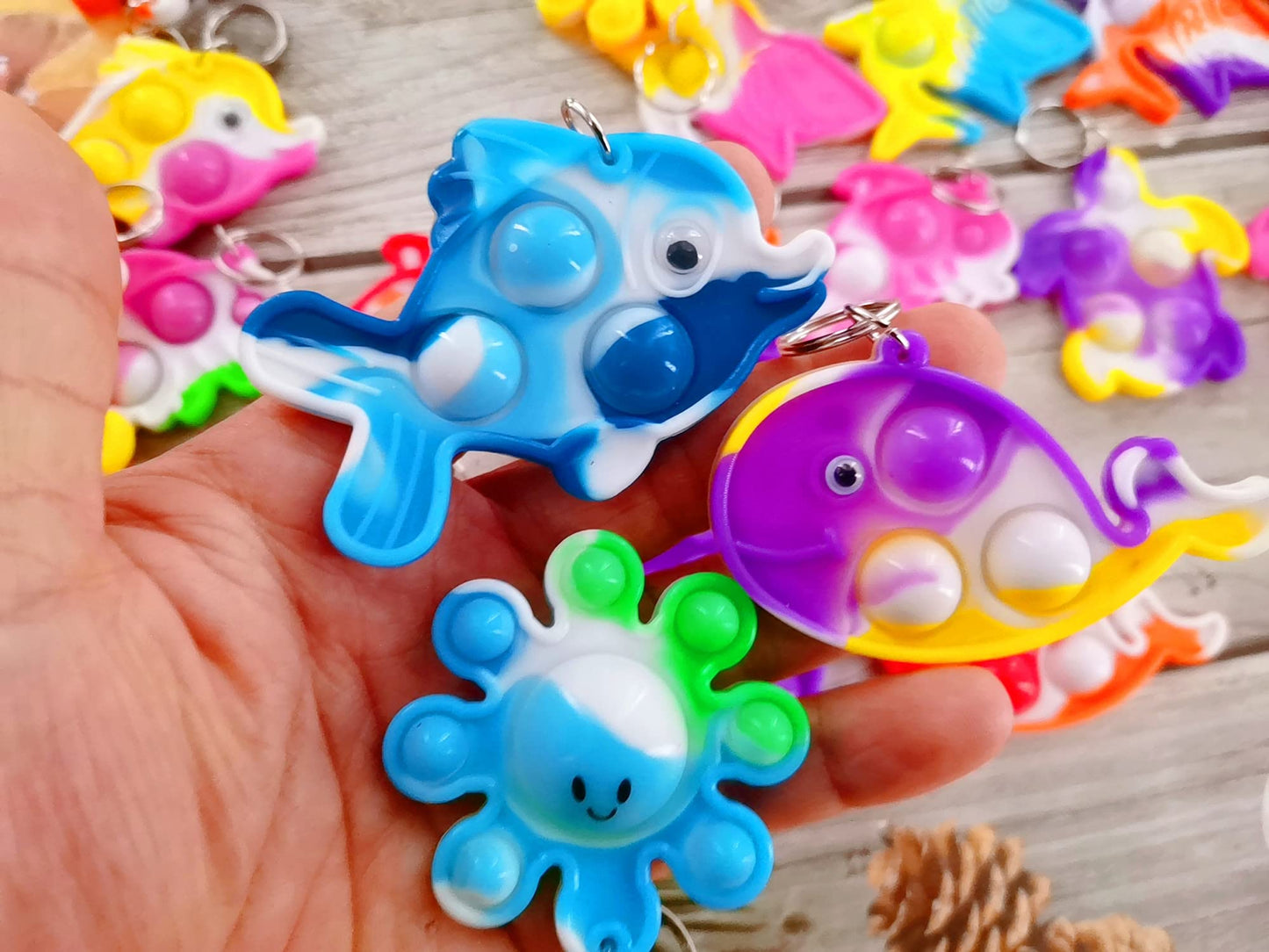 PSDFH Mini Ocean Assorted Fidget Toys - 100 Packs Shark, Turtle, Dolphin, Octopus, Mermaid, Whale - Perfect for Kids, Classroom Gifts, Party Favors